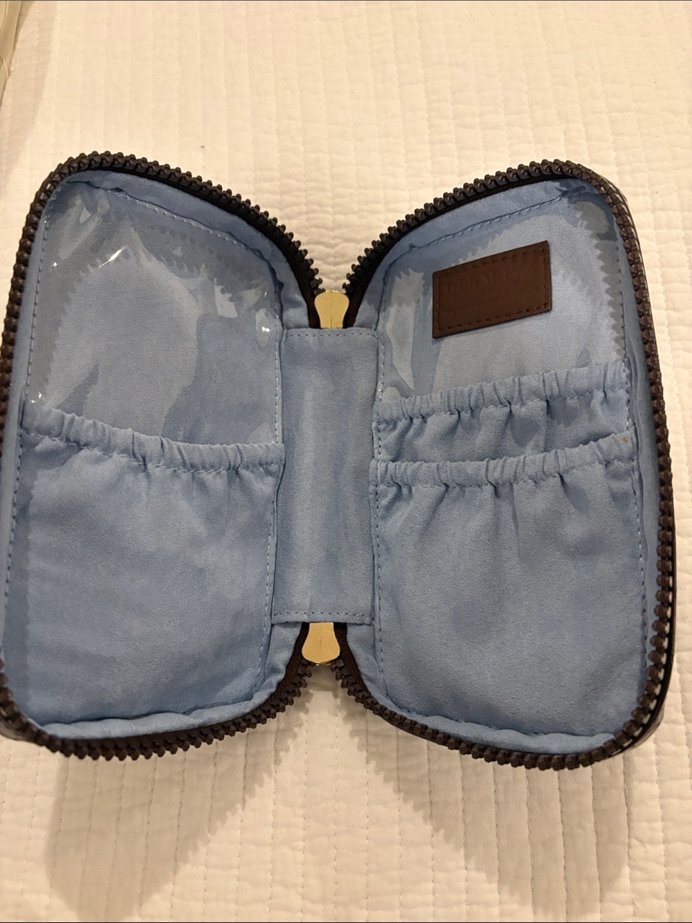 Trish McEvoy make-up brush Case- Brown outside , interior blue with pockets.